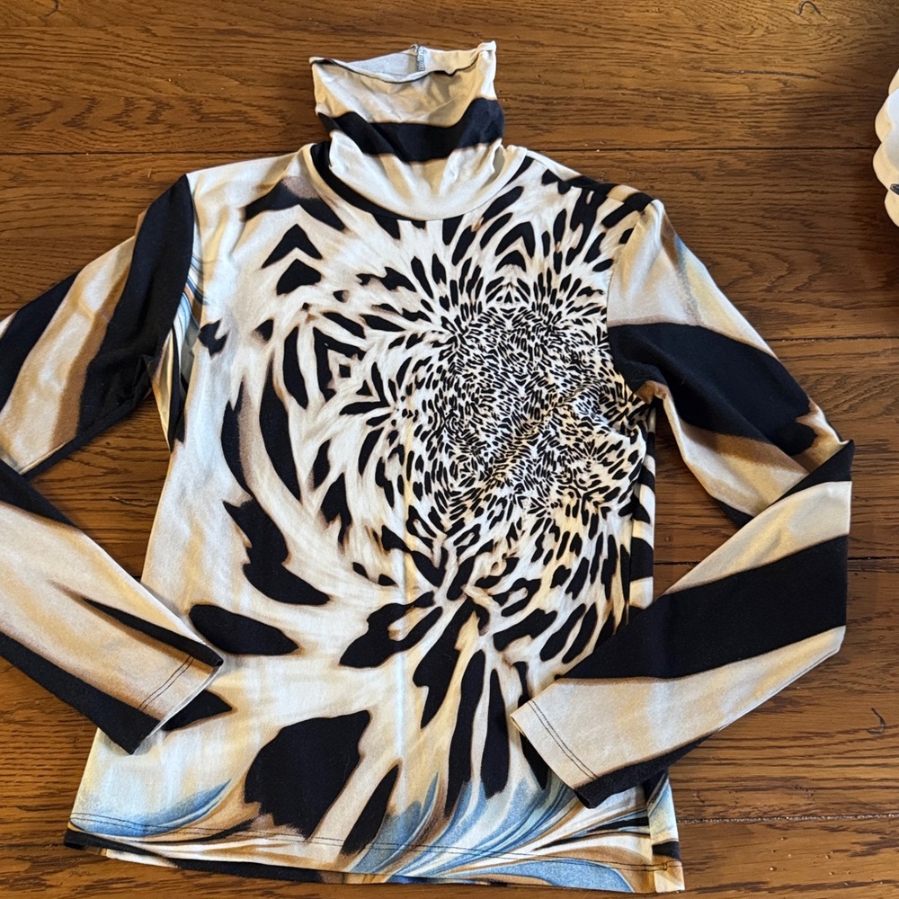 Elegant Women's Black and Cream Turtleneck Top